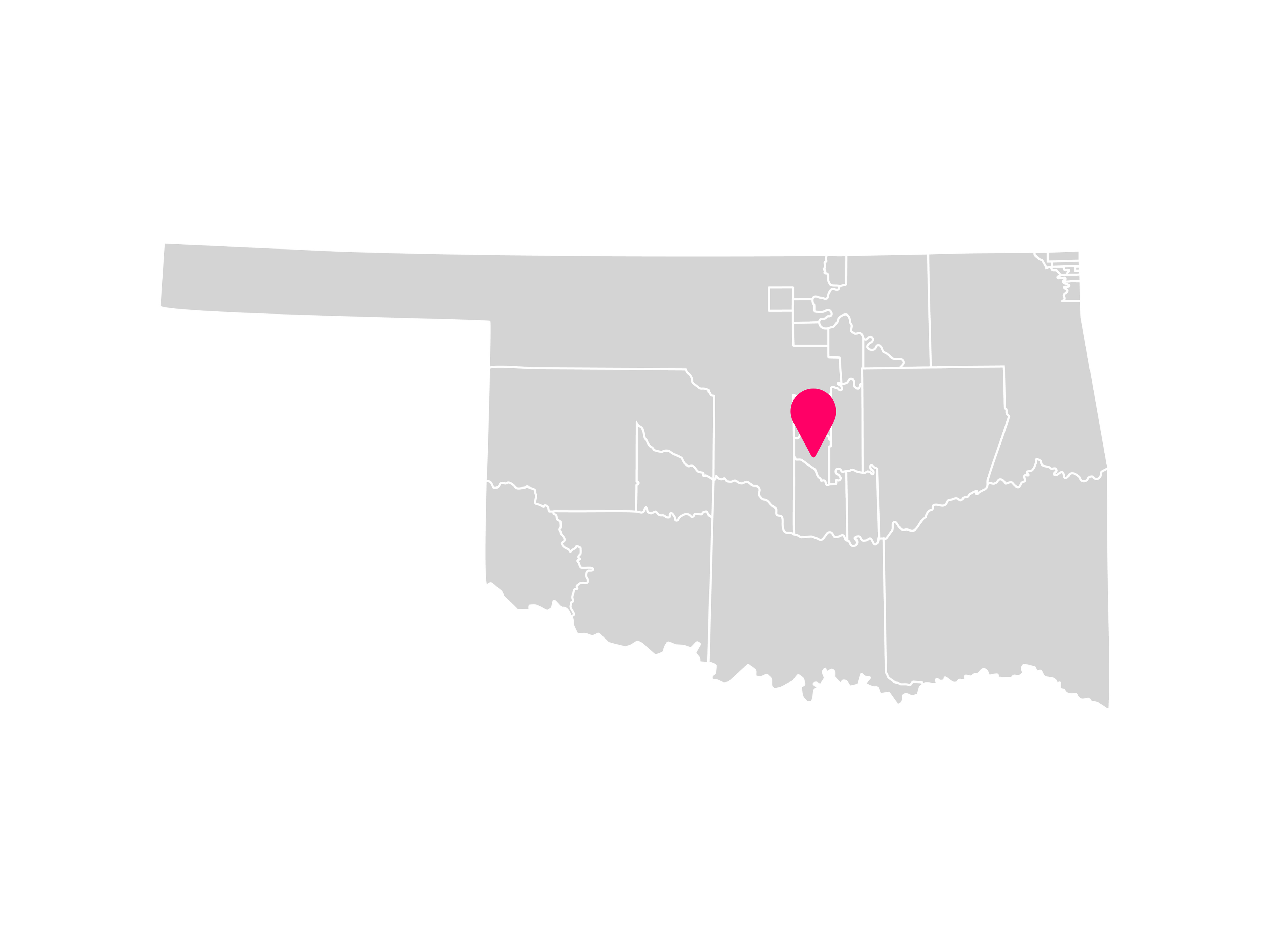 A gray map showing the tribal jurisdiction areas of Oklahoma with a pink pin marking McCloud, Oklahoma, where the Kickapoo Tribe of Oklahoma is headquartered.